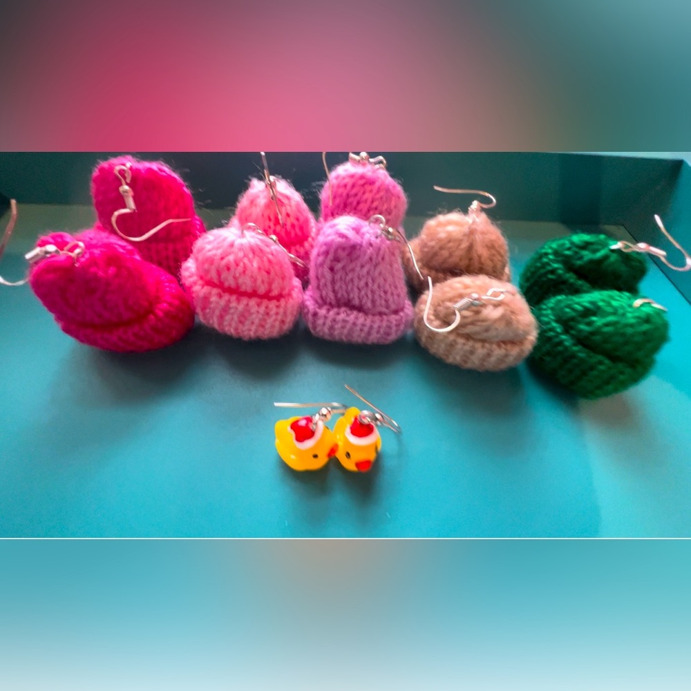 Five pairs of winter hat earrings and bonus Santa hat ducks
